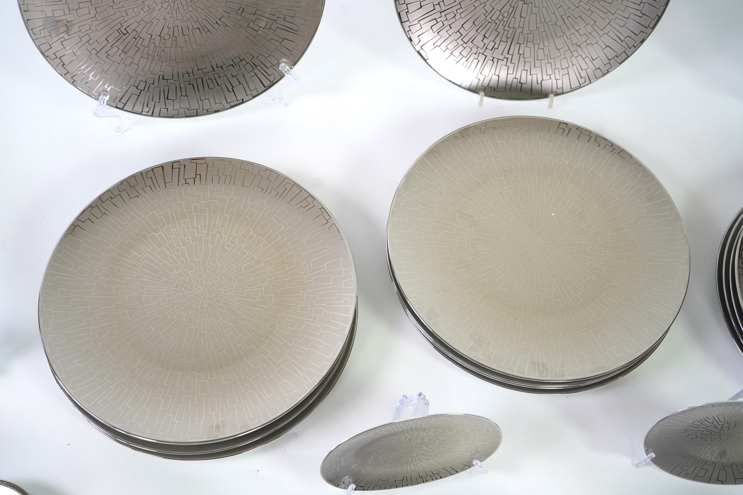 A collection of Rosenthal studio line TAC Gropius Skin platinum dinnerware, largest 33cm in diameter